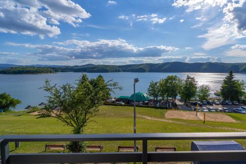 a view of a lake from a balcony at Willa Admirał Solina in Solina