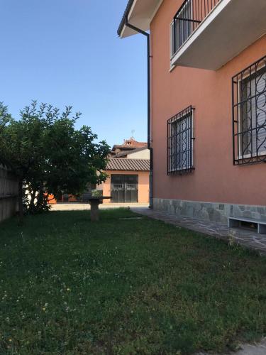 an empty yard in front of a building at Villa Oleandri in Carmagnola