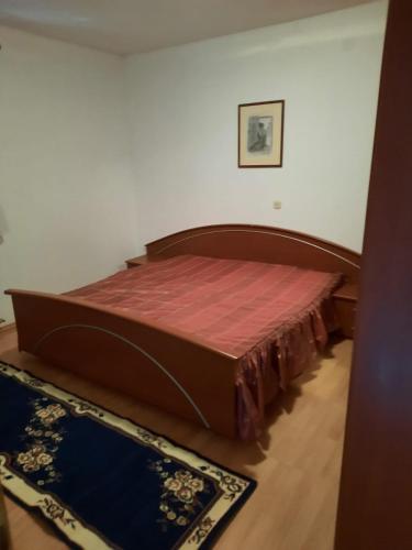 Postel nebo postele na pokoji v ubytování Apartman Kapelica