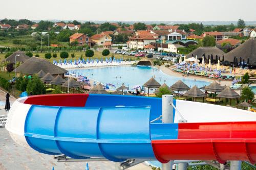 a large pool at a resort with people in it at S Club Resort Hotel Aqua Park and Spa in Belgrade