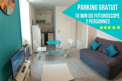 a living room with a couch and a table at Appartement entier meublé à Beaumont proche Futuroscope et Poitiers Technopole in Beaumont