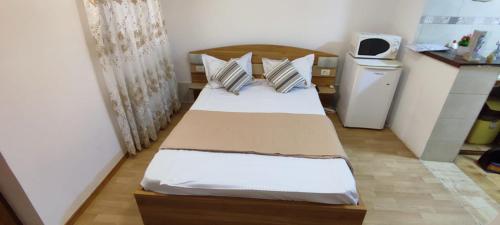 Katil atau katil-katil dalam bilik di Vila Florelena