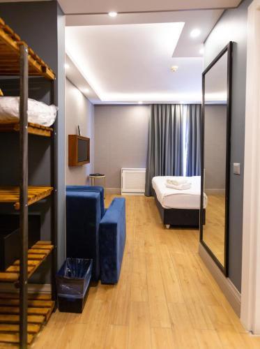 Postel nebo postele na pokoji v ubytování Alan Suites