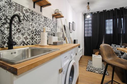 Dapur atau dapur kecil di Apartamentos Rios