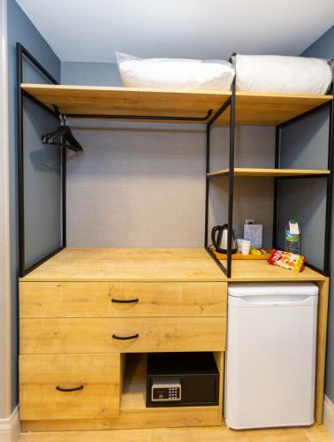 Kuchyň nebo kuchyňský kout v ubytování Alan Suites