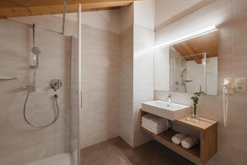 Et badeværelse på Untermairhof Appartment Residence