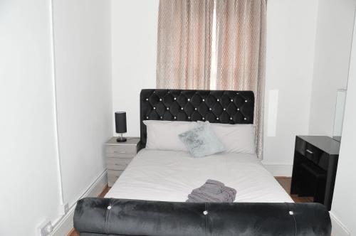 Letto o letti in una camera di Virtue House
