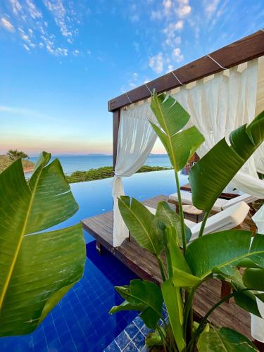 a villa with a view of the ocean at LAUR HOTELS Experience & Elegance in Didim