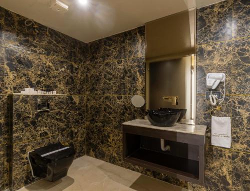 Koupelna v ubytování Divan Clarks Inn Goa