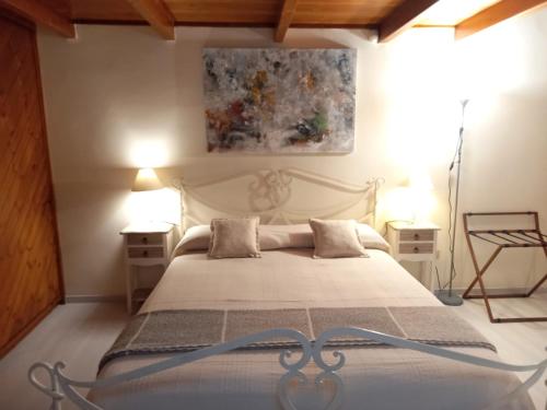 Postel nebo postele na pokoji v ubytování Casetta Rubichi Apartment