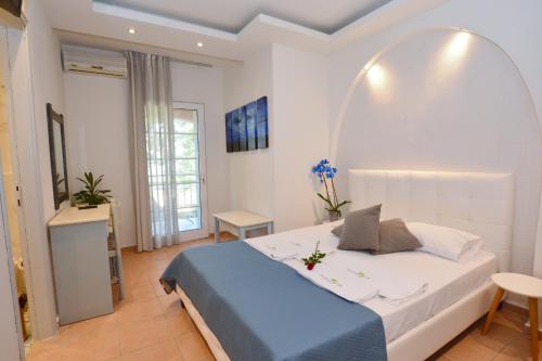 Giường trong phòng chung tại Dimitriadis fresh Edem