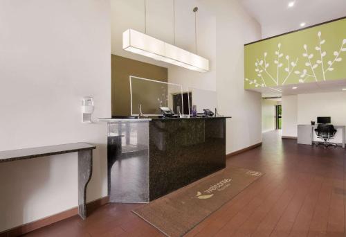 an empty room with a reception desk in a building at Sleep Inn Tanglewood in Roanoke