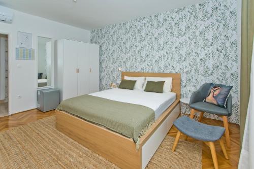 Postel nebo postele na pokoji v ubytování Hvar Deluxe Rooms