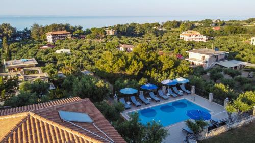 an aerial view of a villa with a swimming pool at Aeolos Zante Villas with Heated Pool in Vasilikos