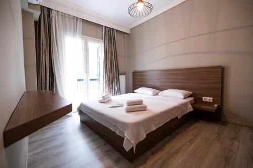 Posteľ alebo postele v izbe v ubytovaní Delmare MQUEEN Apartment