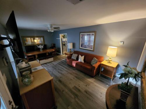 a living room with a couch and a table at Near Beale Street, 6BR - 3BA 16 BEDS Sleeps up to 37 Guest in Memphis