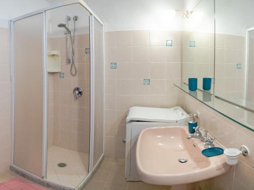 a bathroom with a shower and a sink at Casa Lalù - Rustic apartment with stunning views in Positano