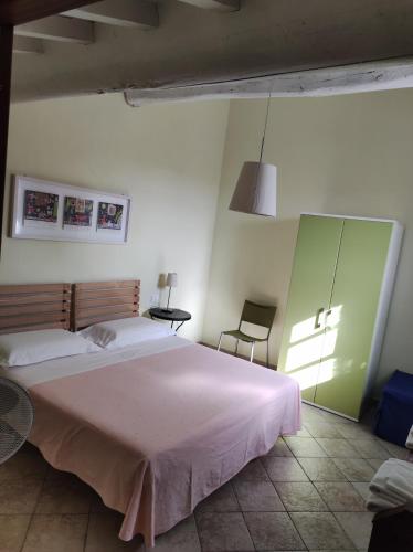 Postel nebo postele na pokoji v ubytování Agriturismo Le Cantine