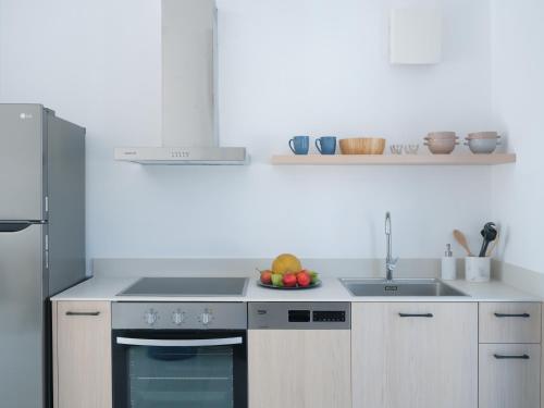 Kuchyňa alebo kuchynka v ubytovaní Etherio Apartment V