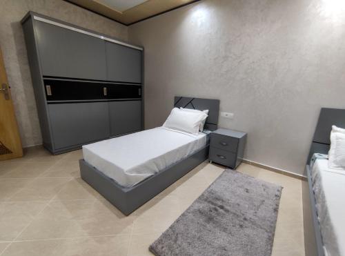 Postel nebo postele na pokoji v ubytování Appartments Achahbar