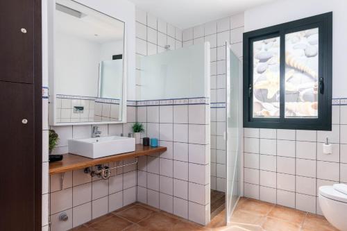 Koupelna v ubytování YourHouse Romani Villa