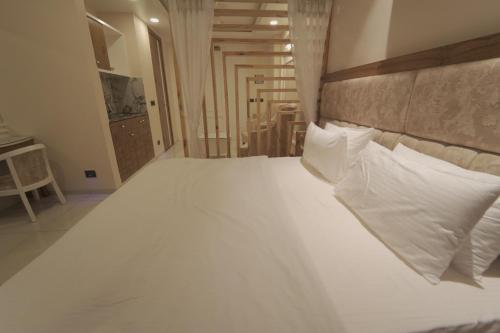 Myst Luxury staysにあるベッド
