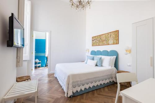 Postel nebo postele na pokoji v ubytování Lux Aurea
