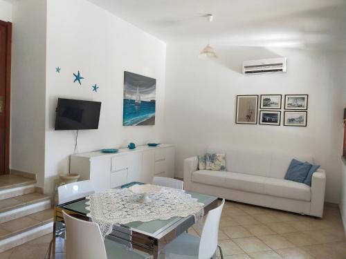 Posezení v ubytování Villa ALBERTA - Villasimius, spiaggia di Campus
