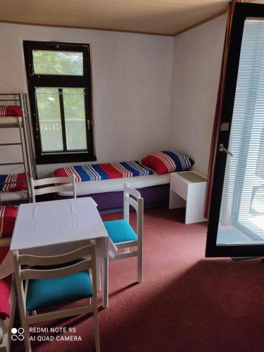 Postel nebo postele na pokoji v ubytování Sobe GRAJSKA