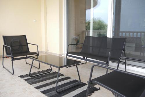 Coin salon dans l'établissement Villa Nastazia