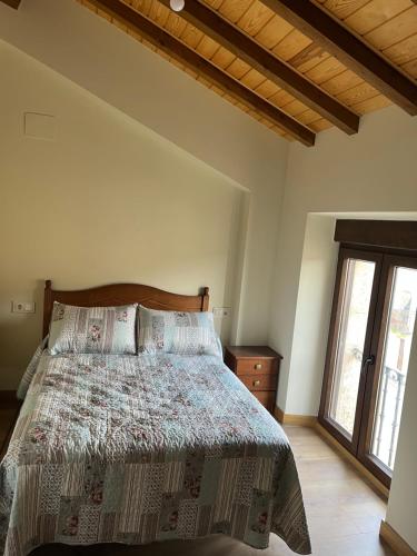 Postel nebo postele na pokoji v ubytování Casa Marite Vivienda de uso turístico