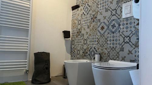 Koupelna v ubytování Cascina GianTino suite Sughero - G A Y - M E N - O N L Y