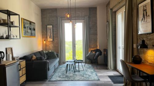 Posezení v ubytování Cascina GianTino suite Sughero - G A Y - M E N - O N L Y