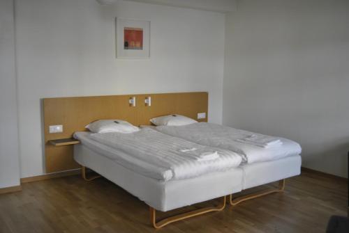 Ronneby Cityhotellにあるベッド