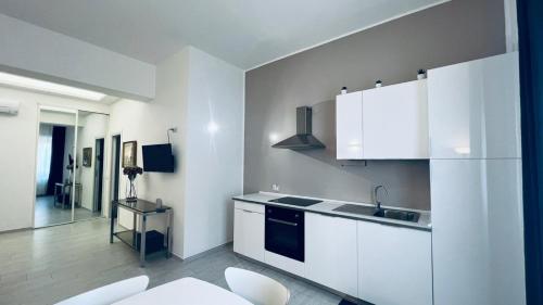 Kuchyň nebo kuchyňský kout v ubytování Riviera Apartments