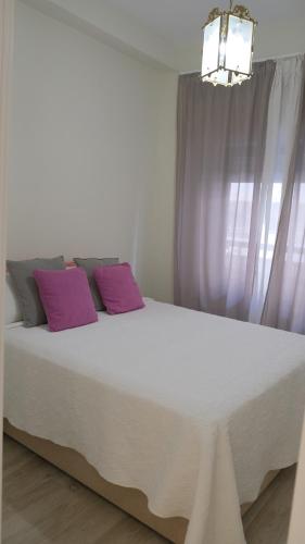 Posteľ alebo postele v izbe v ubytovaní Apartamento Marbella playa