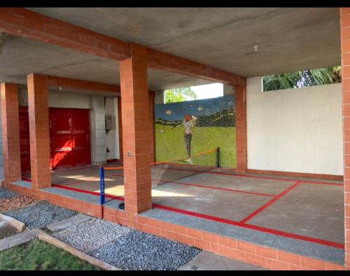 a building with a painting of a man in a field at Holiday Appartment Elbe in Lomé
