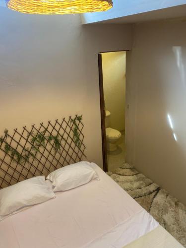 Una cama o camas en una habitación de BAMBUU