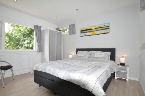Cama o camas de una habitación en Vakantiewoning nabij Toverland