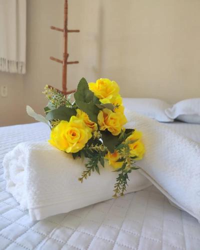 Postel nebo postele na pokoji v ubytování Pousada Flor D' Açucena