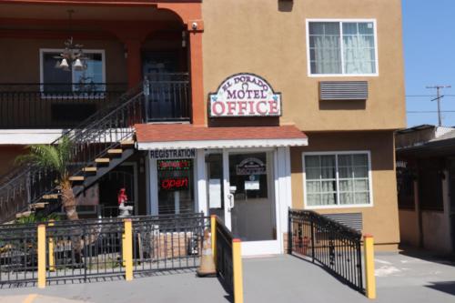 a building with a sign that reads motel office at El Dorado Motel in Gardena