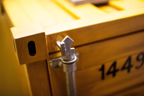 a close up of a lock on a wooden box at B&B Le Dimore Mezza Costa in San Casciano in Val di Pesa