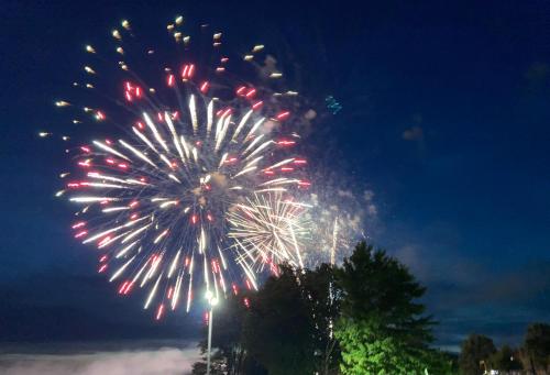 a firework display in the sky at night at Lakeshore Suites in North Bay