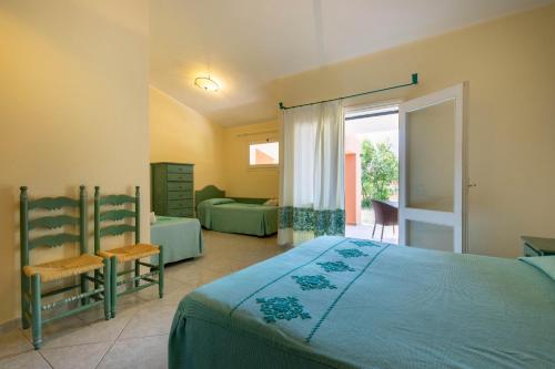 Postel nebo postele na pokoji v ubytování Club Hotel Marina Seada Beach