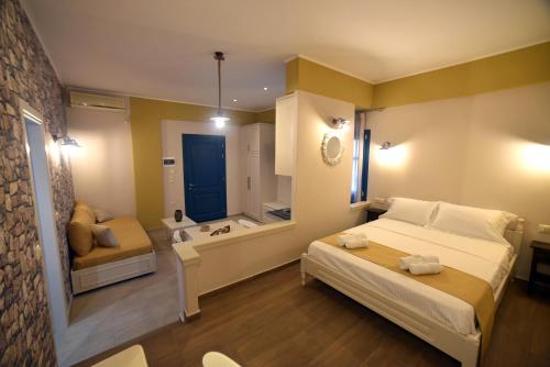 a bedroom with a large bed and a bathroom at Shining Star Petra in Petra