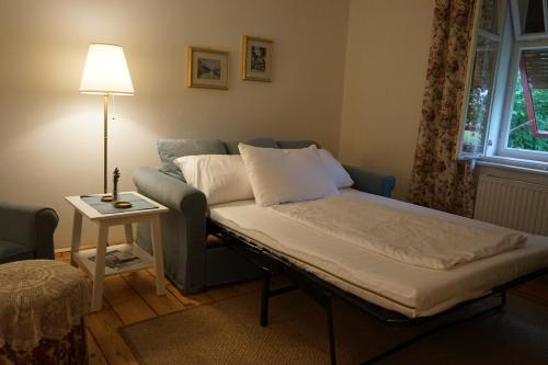 מיטה או מיטות בחדר ב-Landhaus im Hartbergerland