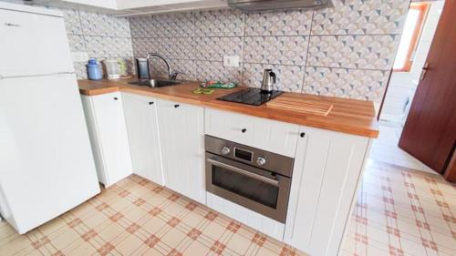 Kuchyň nebo kuchyňský kout v ubytování Casa Nest