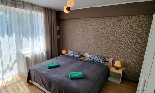 Postel nebo postele na pokoji v ubytování Gościniec Skolimówka Restauracja i pokoje ze śniadaniem na Kaszubach