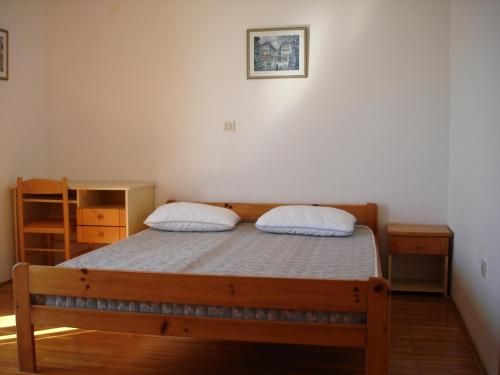 Кровать или кровати в номере Apartments Elizabeth