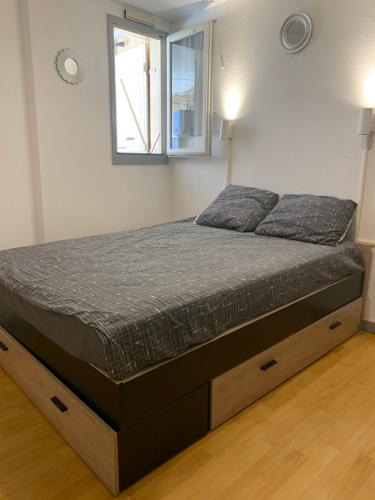 Posteľ alebo postele v izbe v ubytovaní Bel Appartement en bord de mer, accès direct à la plage